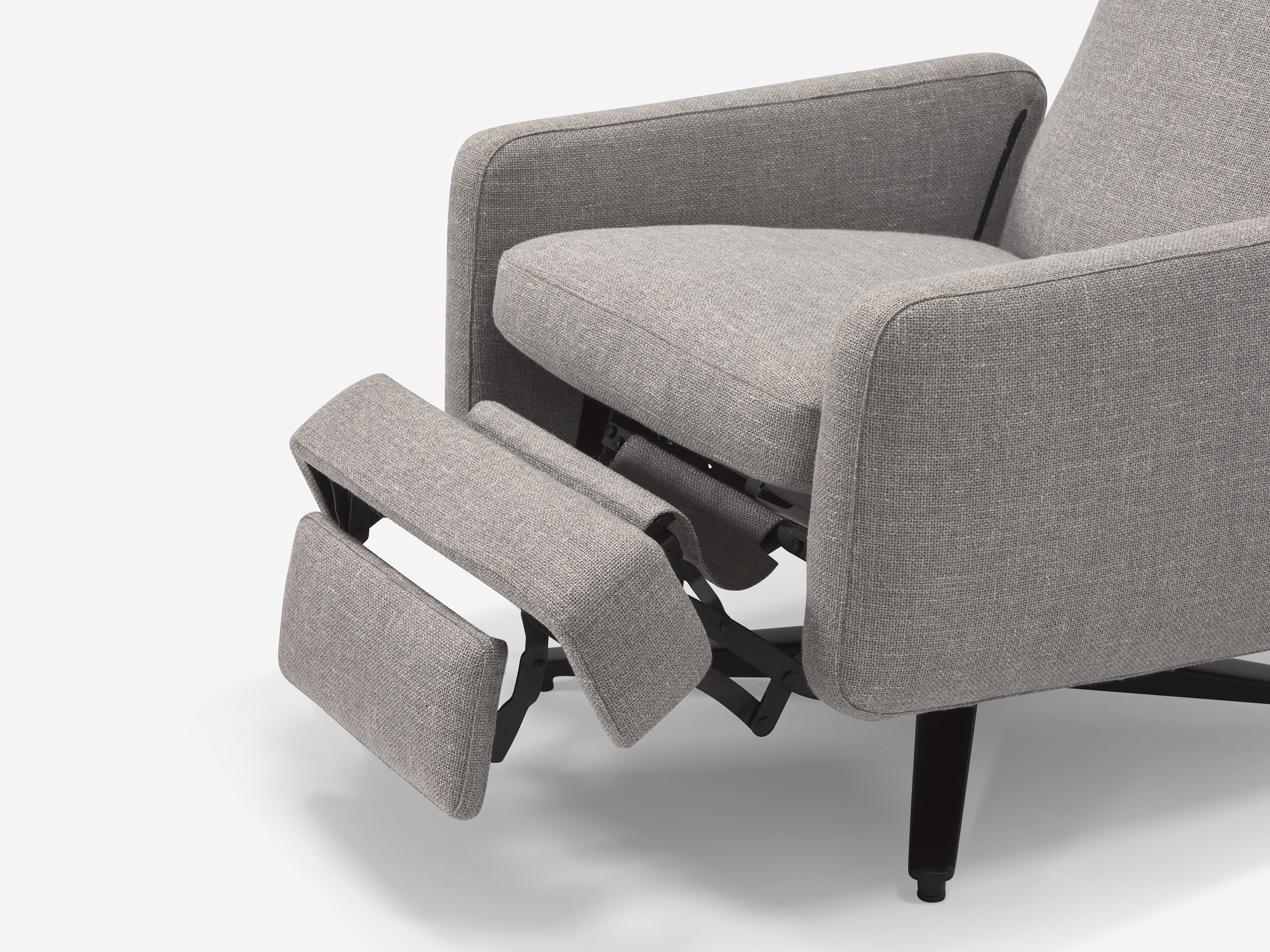 Grey fabric reclining chair with foot rest reclined seat detail view